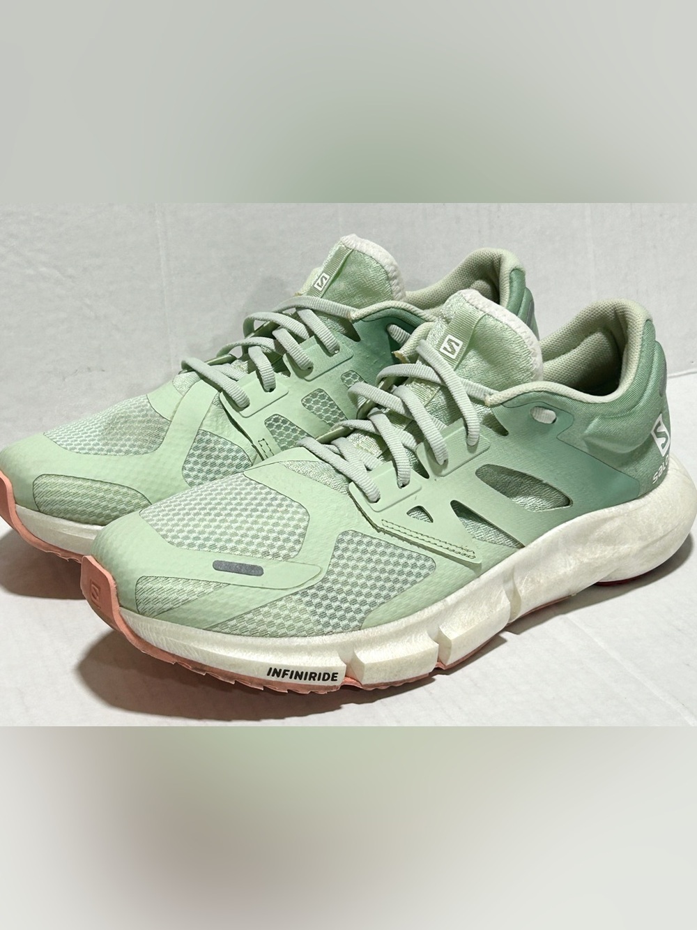 Salomon Women's Mint Green Athletic Shoes with Peach Outsole Accent